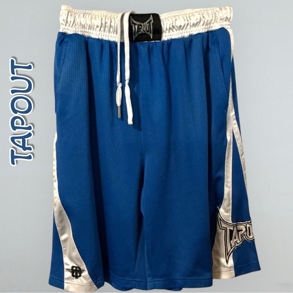 🌺Tapout MMA fight shorts featuring branded logos on the waistband and leg.